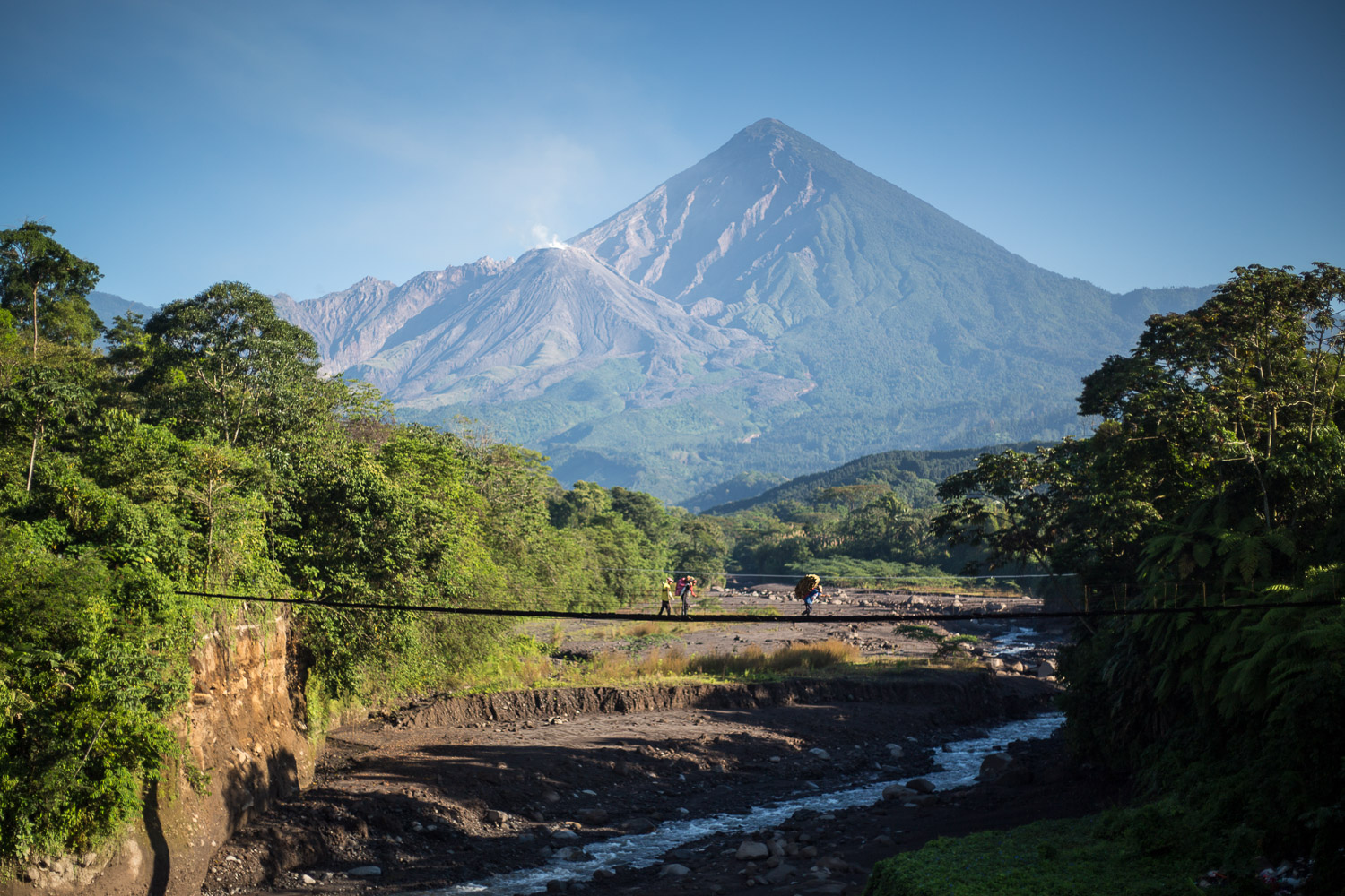 One of the greatest hazards from volcanoes is a lahar, a volcanic mudflow that occurs frequently in the rainy season. Lahars from Santiaguito can have a lot of energy and threaten communities, like El Palmar, shown here, that was devastated in the 1980’s from lahars.